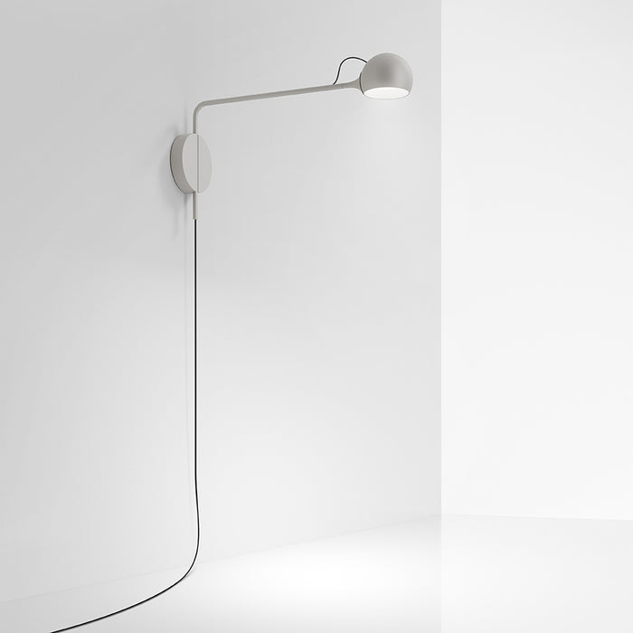 Ixa Plug-In Wall Sconce by Artemide  - White Finish