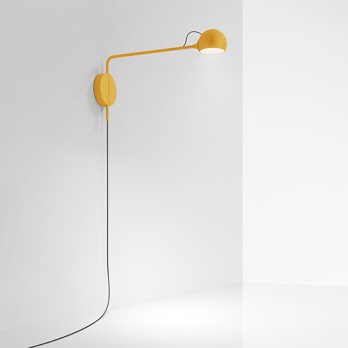 Ixa Plug-In Wall Sconce by Artemide  - Yellow Finish