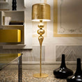 Load image into Gallery viewer, Eva Floor Lamp - Gold Leaf Finish
